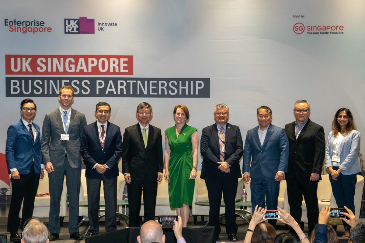 Mr Tan (third from right) with EnterpriseSG chairman Peter Ong (fourth from left) and British High Commissioner to Singapore Kara Owen (centre) at the announcement of the UK-Singapore Collaborative R&D Call. PHOTO: ENTERPRISE SINGAPORE