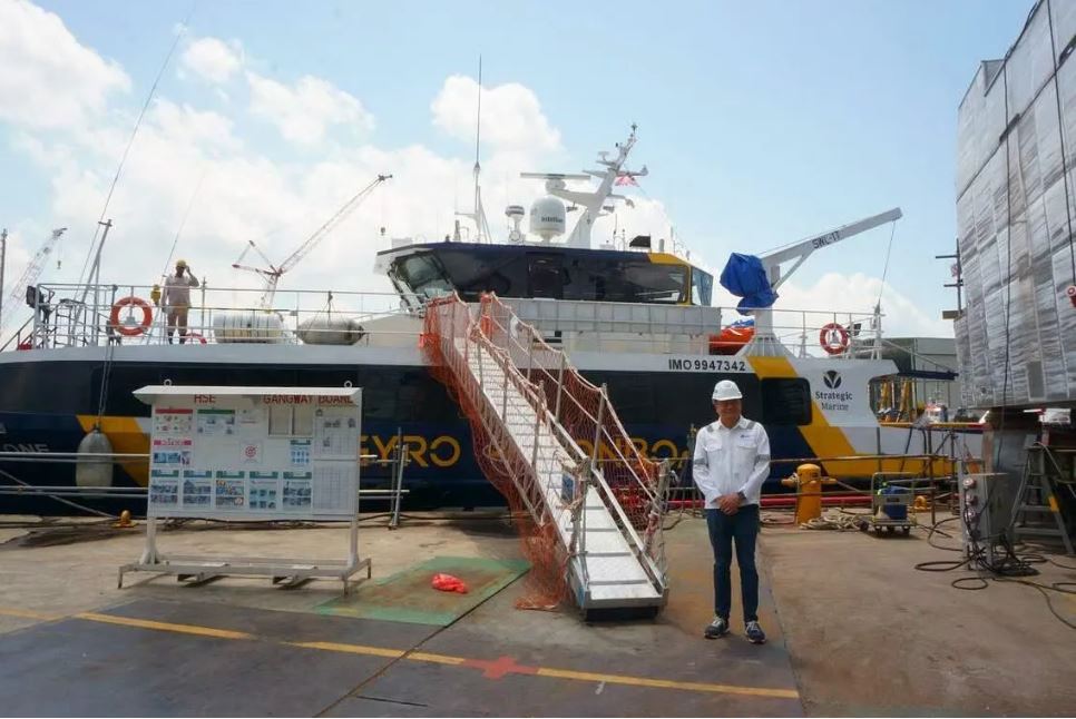 Singapore shipbuilder Strategic Marine’s chief executive officer Chan Eng Yew with the company’s fast crew boat, Gen-4 One. PHOTO: GOH RUOXUE, BT