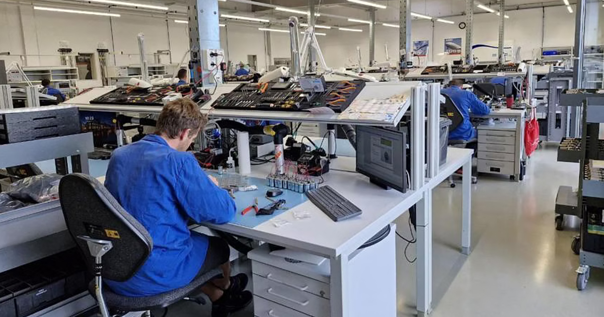 Staff assemble electronic parts at the Singapore Aerospace Manufacturing production facility at Bad Tolz, Bavaria, Germany. ST PHOTO: SUE-ANN TAN